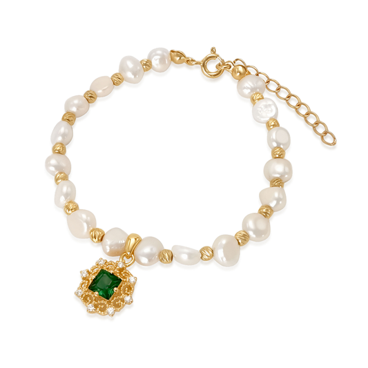18K gold-plated freshwater pearl bracelet with green cubic zirconia pendant — elegant handmade beaded bracelet for women, luxury fine jewellery by Ploutos Jewellery.