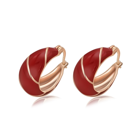 Ploutos Jewellery Crimson Enamel Silver Hoop Earrings — bold 925 sterling silver hoops with deep red enamel and 18K gold plating. Modern sculptural design symbolizing elegance, vitality, and feminine confidence from the Abundance Collection.