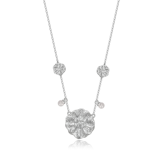 Ploutos Jewellery Luna Bloom Silver Necklace — handcrafted 925 sterling silver floral medallion necklace with delicate natural pearl accents. Elegant silver necklace from the Cosmic Energy Collection inspired by moonlight and feminine grace.
