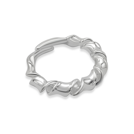 Ploutos Jewellery Waveform Silver Ring — handcrafted recycled 925 sterling silver ring with a sculptural wave-inspired design. The fluid, organic curves reflect light beautifully, symbolizing calm strength and graceful movement. A minimalist piece from the Abundance Collection celebrating flow, balance, and effortless style.