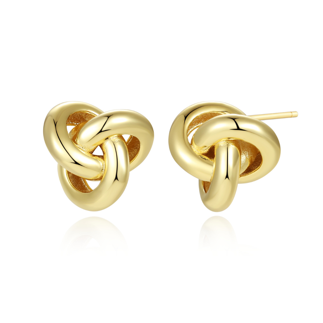 14K gold-plated love knot stud earrings from the Abundance Collection — timeless minimalist jewellery symbolizing unity, harmony, and abundance, crafted with high-polish finish by Ploutos Jewellery.