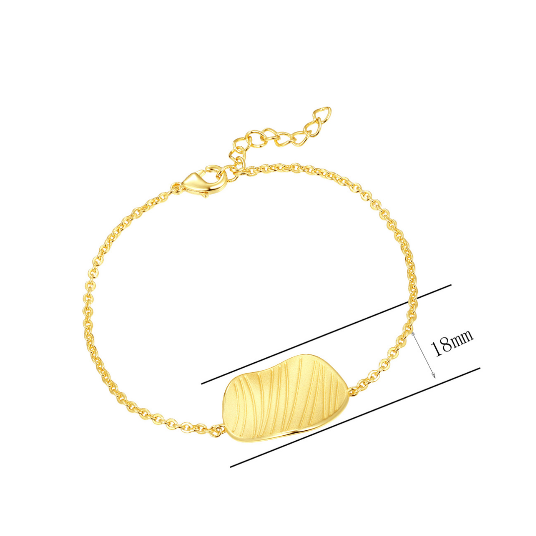 14K gold-plated textured bar bracelet with adjustable chain and 18mm molten-style pendant — elegant minimalist design from the Wealth Collection by Ploutos Jewellery, crafted to embody prosperity and refined luxury.