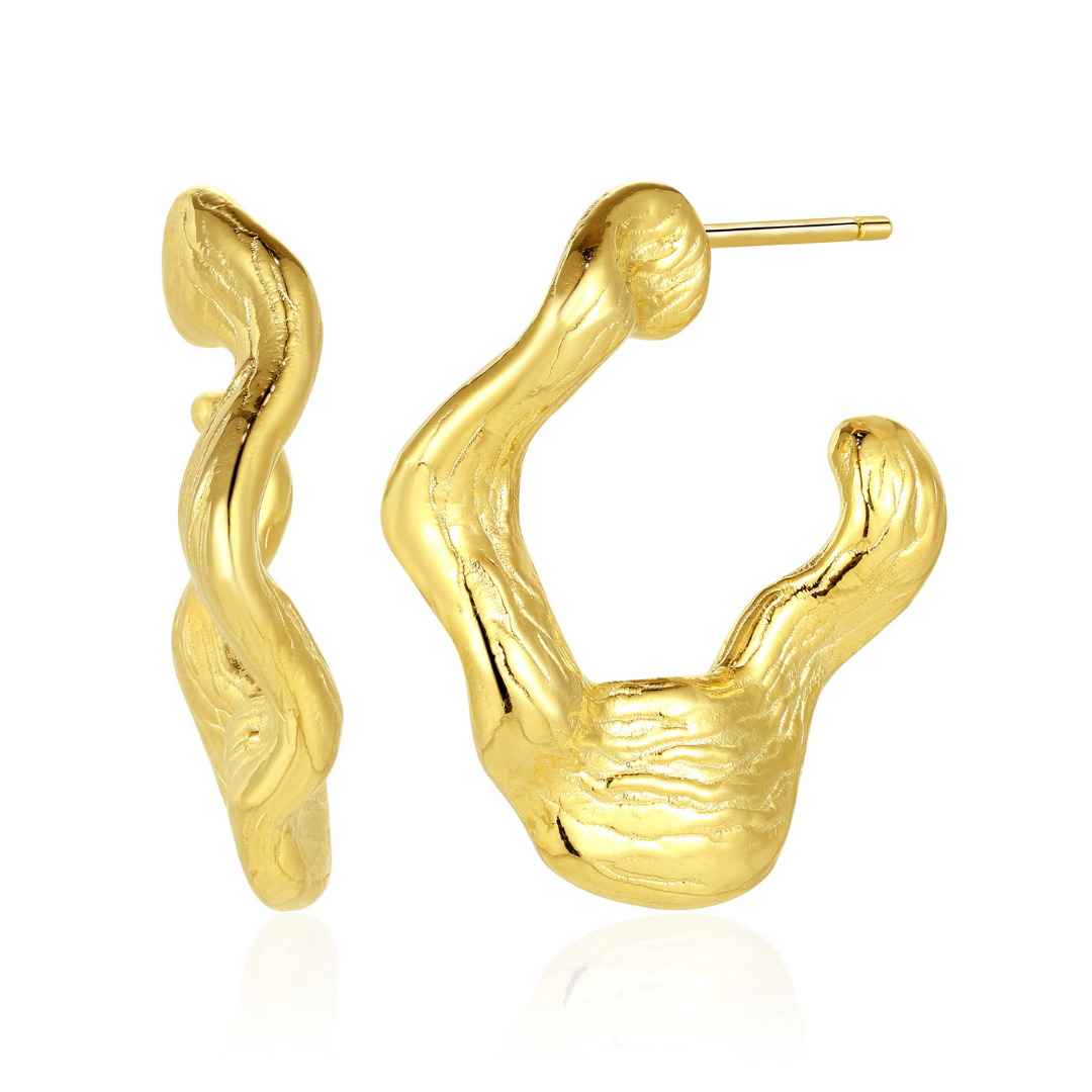 14K gold-plated sculptural hoop earrings from the Wealth Collection — organic molten-texture design symbolizing flowing prosperity and quiet luxury, handcrafted by Ploutos Jewellery.