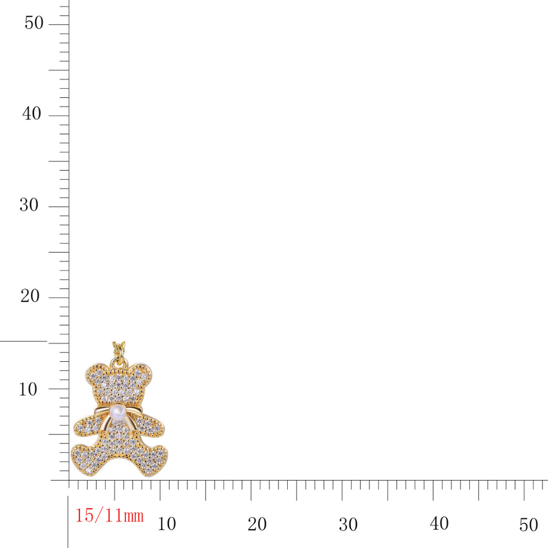 14K gold-plated teddy bear pendant with cubic zirconia and pearl, measuring 15mm x 11mm — sparkling luxury charm by Ploutos Jewellery, size reference image.