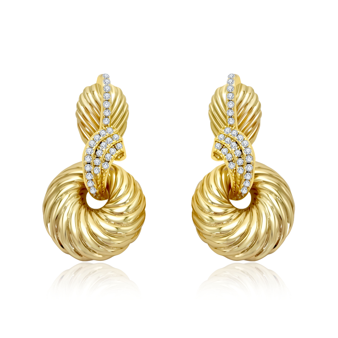 14K gold-plated twisted circle statement earrings from the Wealth Collection — luxurious spiral design with pavé zircon accents symbolizing abundance and timeless elegance, by Ploutos Jewellery.