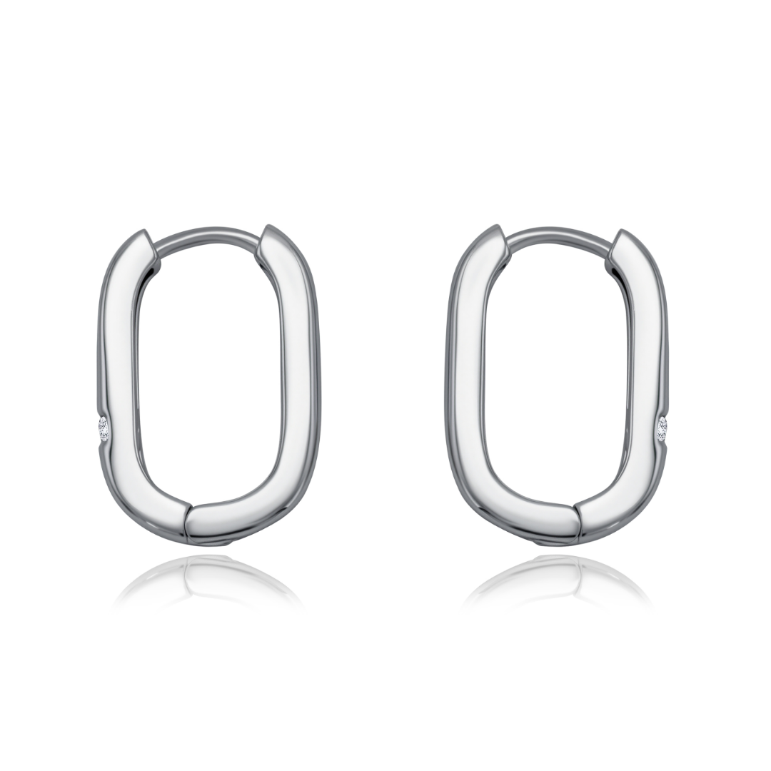 Ploutos Jewellery Arco Silver Rectangular Hoop Earrings — 925 sterling silver geometric oval-rectangle hoops with mirror-polished finish, modern minimalist design from the Abundance Collection, symbolising strength and quiet elegance.