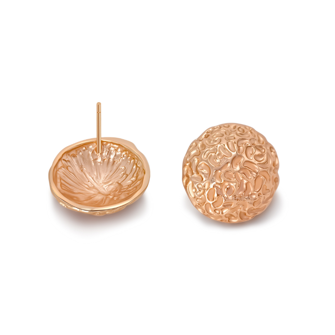 Close-up of Ploutos Jewellery Aurora Dome Gold Stud Earrings — handcrafted from recycled 925 sterling silver with 18k gold plating. Featuring an organic hand-textured exterior and a detailed inner dome design, blending artisanal craftsmanship with modern minimalism.