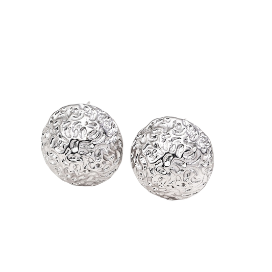 Ploutos Jewellery Aurora Dome Silver Stud Earrings — handcrafted from recycled 925 sterling silver with an elegant hand-textured dome surface. Reflecting moonlit shine and organic artistry, these minimalist silver studs embody quiet strength and refined sophistication.