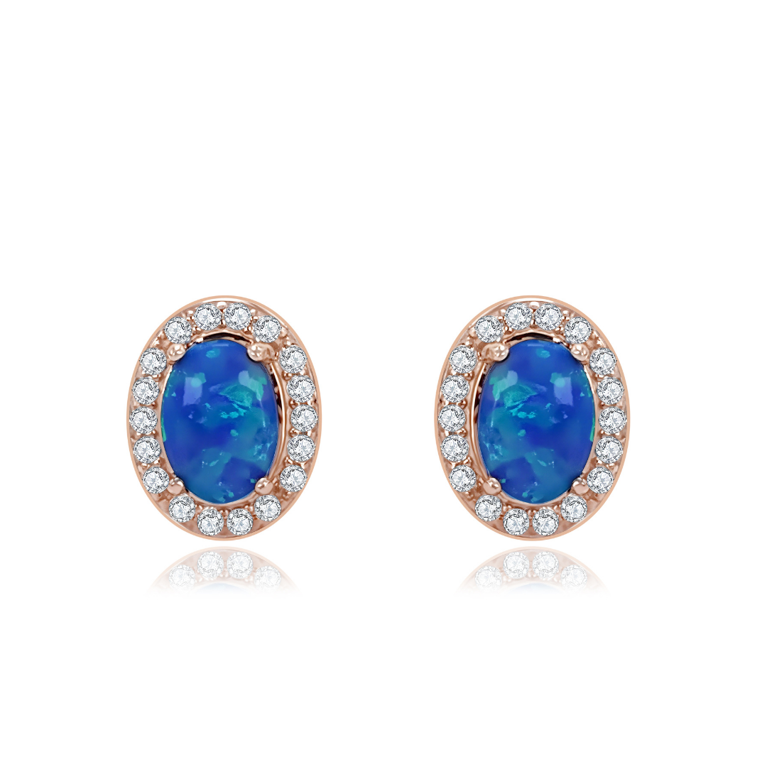 Aurora Opal Stud Earrings in 925 sterling silver with rose gold plating — vivid blue opal center surrounded by sparkling white stones from Ploutos Jewellery’s Cosmic Energy Collection. Symbol of light, transformation, and timeless elegance.