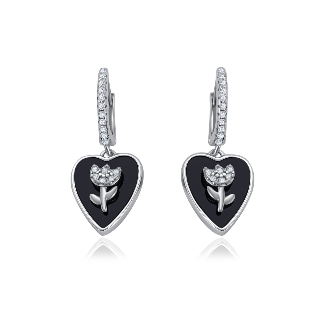 Ploutos Jewellery Bloom in Noir Earrings in 925 sterling silver — black onyx heart drop earrings with silver flower design from the Abundance Collection, symbolising strength, elegance, and quiet femininity.