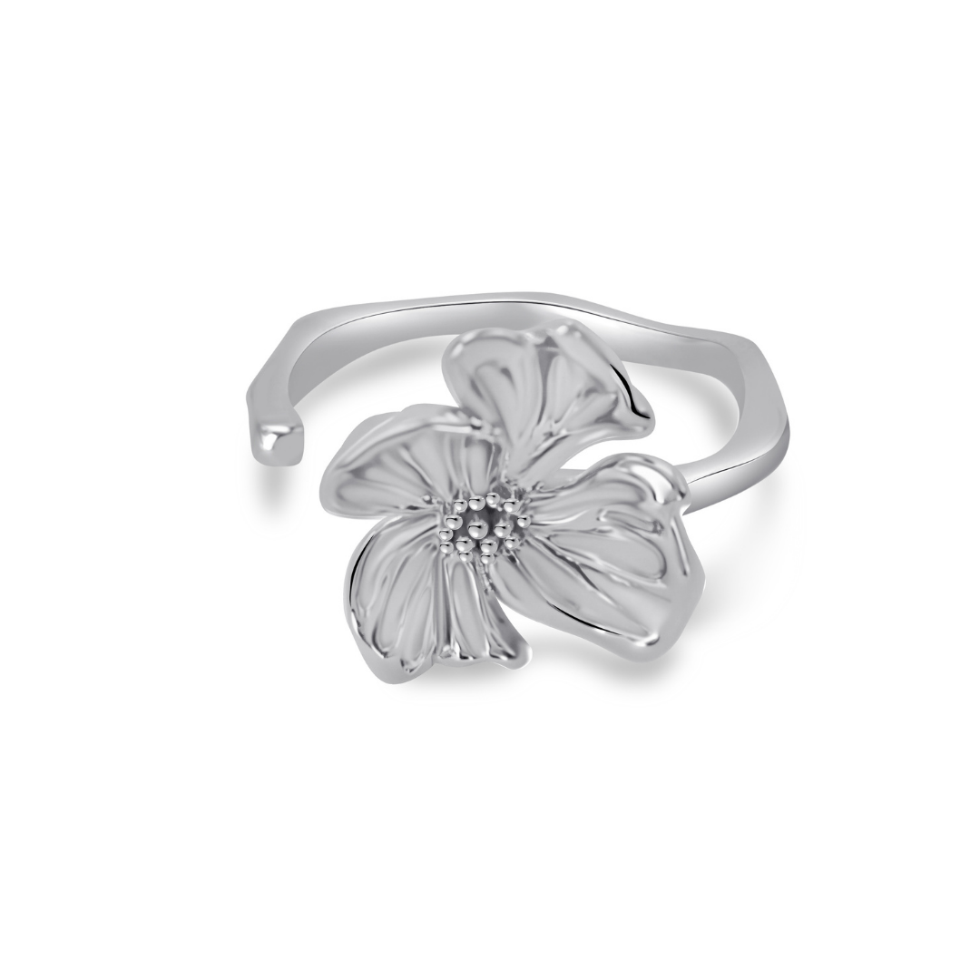 Ploutos Jewellery Bloom Silver Flower Ring — handcrafted open floral ring made from recycled 925 sterling silver. Features sculpted petals that reflect light gracefully, symbolizing renewal, femininity, and quiet strength. Elegant design from the Abundance Collection.