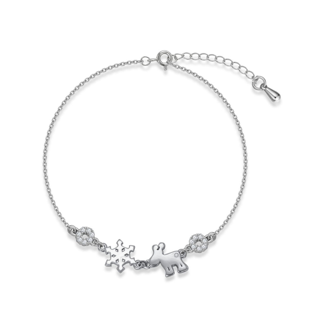 Ploutos Jewellery Christmas Bracelet — handcrafted 925 sterling silver bracelet with snowflake and reindeer charms, symbolising joy, purity, and festive togetherness. Accented with sparkling cubic zirconia stones for a touch of holiday elegance from the Abundance Collection.