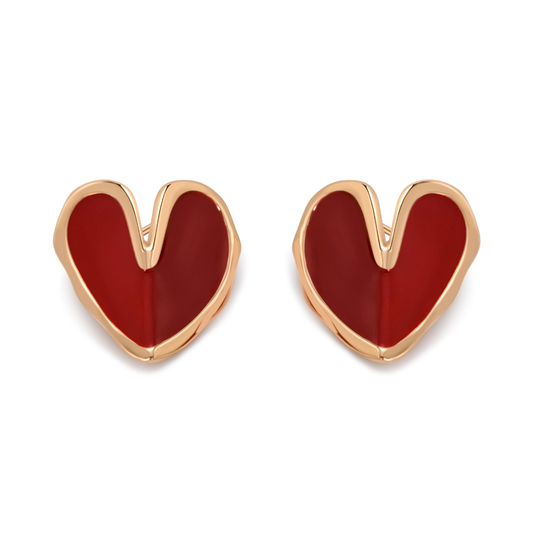 Ploutos Jewellery Crimson Heart Enamel Stud Earrings — handcrafted in 18K gold-plated recycled 925 sterling silver with deep red enamel using the dripping enamel technique. These sculptural heart-shaped earrings from the Abundance Collection symbolize love, confidence, and artistic self-expression with a smooth, fluid finish.