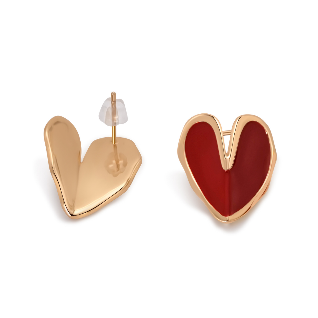 Side and front view of Ploutos Jewellery Crimson Heart Enamel Stud Earrings — 18K gold-plated recycled 925 sterling silver with deep red dripping enamel. These asymmetrical heart-shaped studs from the Abundance Collection showcase artistic craftsmanship and a smooth, high-shine finish, symbolizing modern love and confidence.