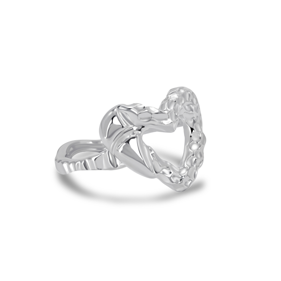 Ploutos Jewellery Eternal Heart Silver Ring — handcrafted from recycled 925 sterling silver with rhodium plating. This sculptural open-heart ring from the Abundance Collection features a textured, organic finish symbolizing love, authenticity, and quiet elegance. Perfect for everyday wear or heartfelt gifting.