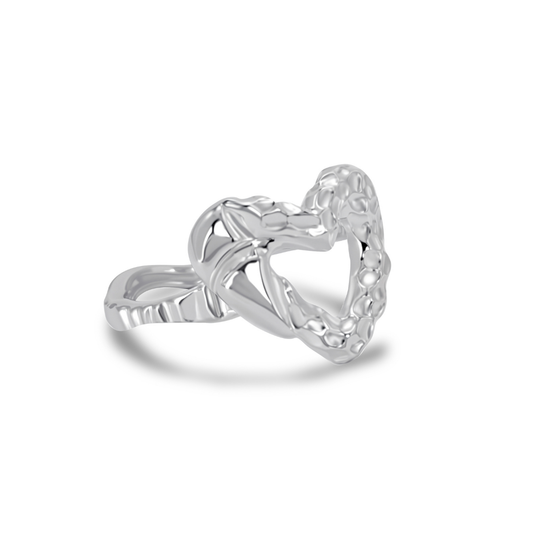 Ploutos Jewellery Eternal Heart Silver Ring — handcrafted from recycled 925 sterling silver with rhodium plating. This sculptural open-heart ring from the Abundance Collection features a textured, organic finish symbolizing love, authenticity, and quiet elegance. Perfect for everyday wear or heartfelt gifting.