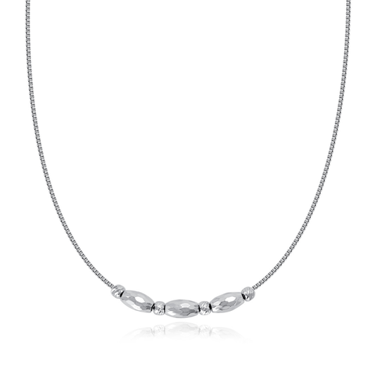 Ploutos Jewellery Ethereal Gleam Necklace — minimalist 925 sterling silver necklace featuring faceted silver beads that reflect light with graceful brilliance. A timeless piece from the Abundance Collection, symbolizing elegance, confidence, and effortless sophistication.