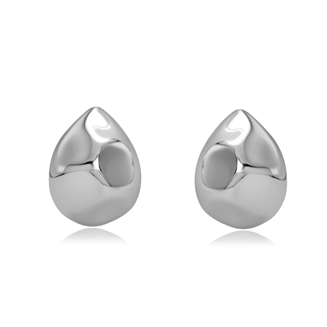 Ploutos Jewellery Fluid Teardrop Stud Earrings — 925 sterling silver sculptural studs with organic liquid-metal finish from the Abundance Collection, reflecting modern elegance and quiet strength.