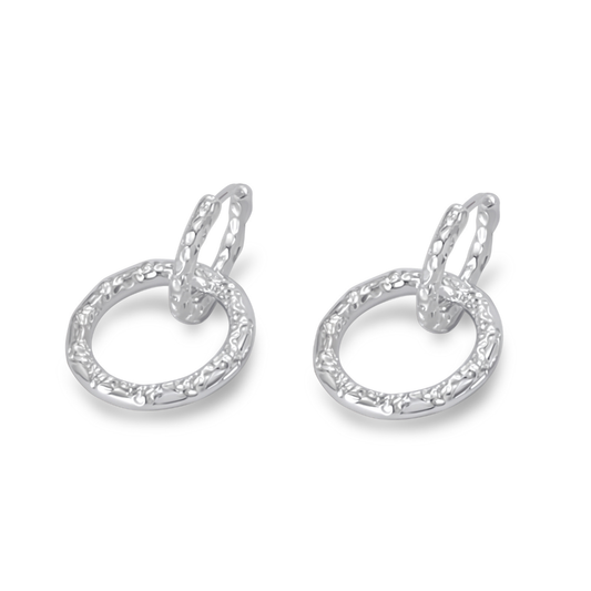 Ploutos Jewellery Luna Duality Silver Earrings — handcrafted from recycled 925 sterling silver with a textured circular drop design. These versatile earrings from the Abundance Collection can be worn as detachable hoops or minimalist studs, reflecting moonlit elegance and modern versatility for everyday luxury