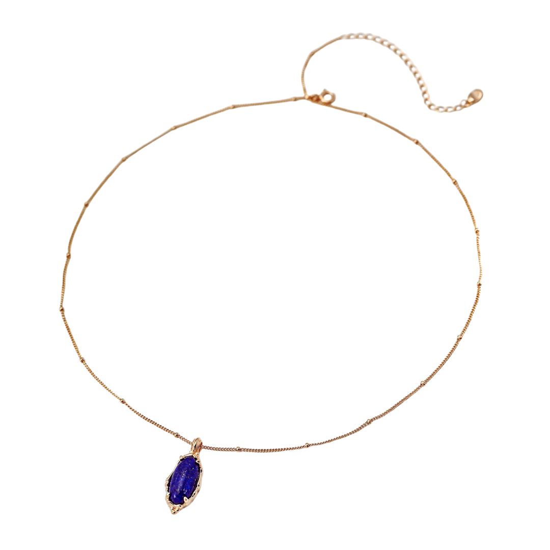 Ploutos Jewellery Midnight Lapis Gold Necklace — 18K vintage gold-plated recycled 925 sterling silver fine chain with deep blue lapis lazuli pendant. Elegant minimalist design inspired by celestial energy and the calm strength of the night sky.