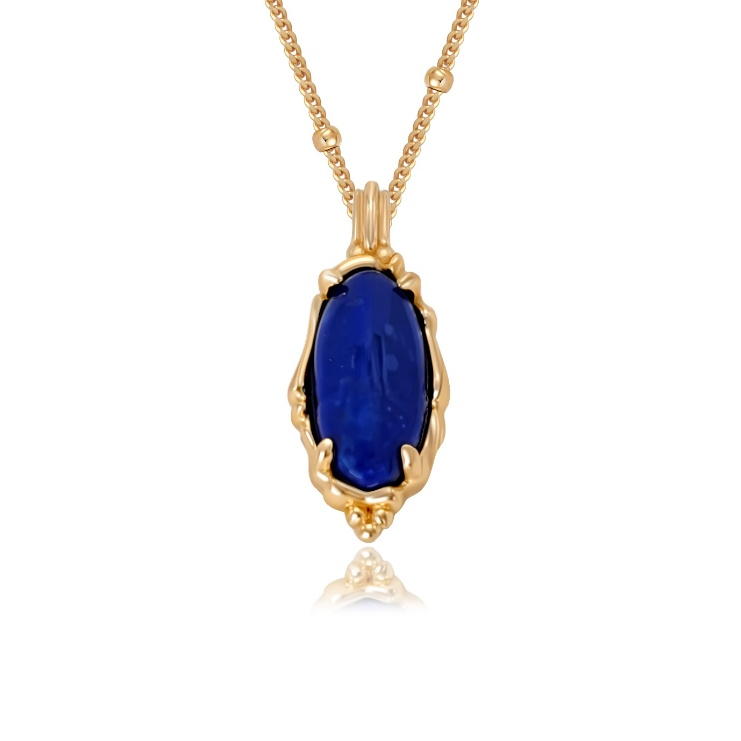 Close-up of Ploutos Jewellery Midnight Lapis Gold Necklace pendant — 18K vintage gold-plated recycled 925 sterling silver setting with deep blue lapis lazuli gemstone. Fine craftsmanship inspired by celestial energy and quiet luxury.
