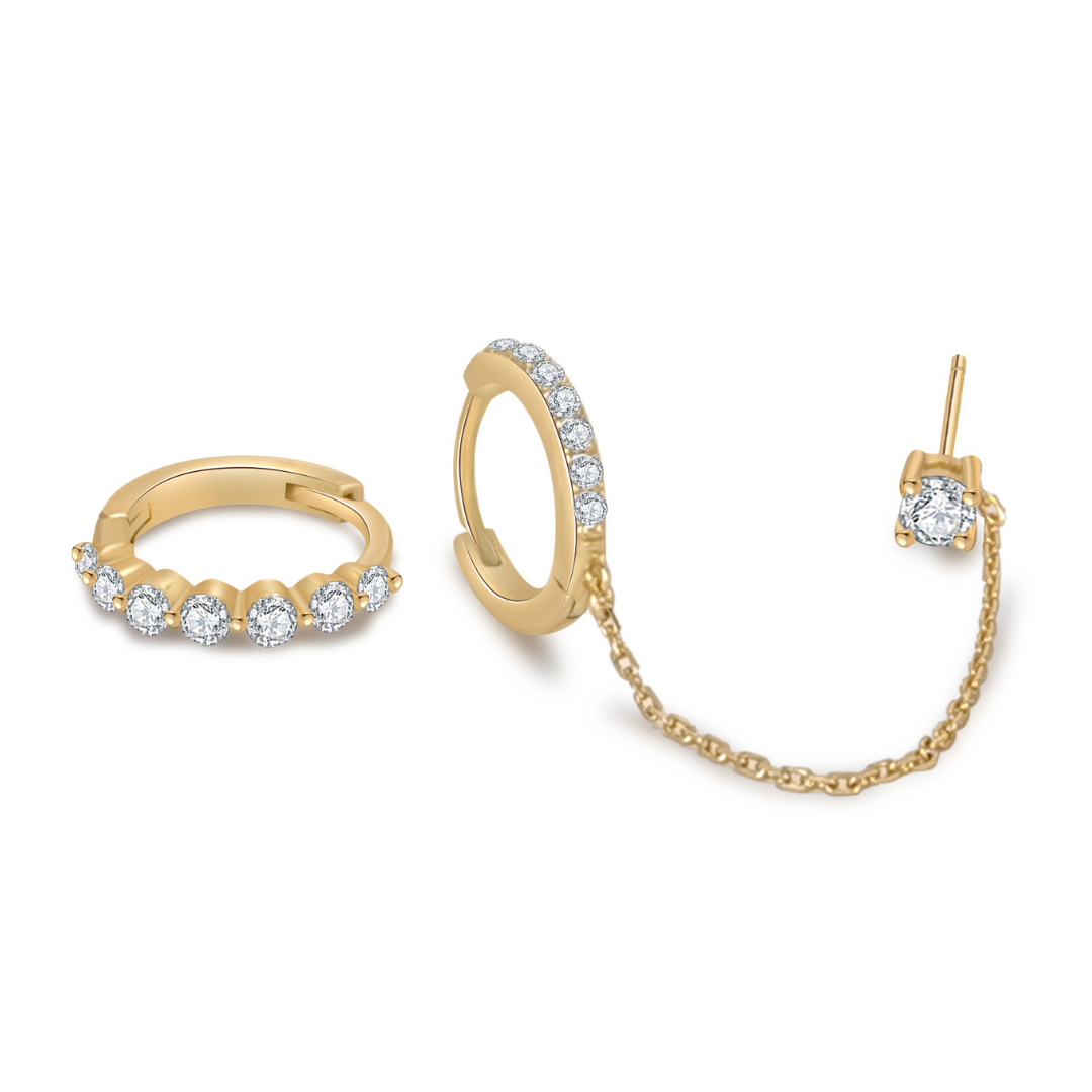Ploutos Jewellery Radiant Chain Gold Huggie Earrings set — 14K gold-plated recycled 925 sterling silver featuring cubic zirconia stones and a delicate connecting chain. From the Abundance Collection, this elegant double-hoop design blends classic sparkle with contemporary edge, perfect for modern luxury style.
