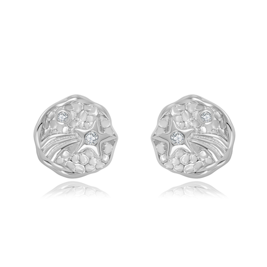Ploutos Jewellery Starlight Trail Silver Stud Earrings — handcrafted from recycled 925 sterling silver with crater-textured dome and cubic zirconia shooting star details. Elegant moon-inspired silver studs symbolizing light, resilience, and cosmic serenity.