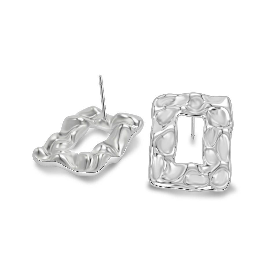 Ploutos Jewellery Waveform Silver Stud Earrings — irregular sculptural square studs handcrafted in rhodium-plated 925 sterling silver. Inspired by the rhythm of water and organic movement, part of the Wealth Collection celebrating fluid elegance and individuality.